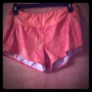 Orange underarmour dry-fit shorts w/hidden pocket